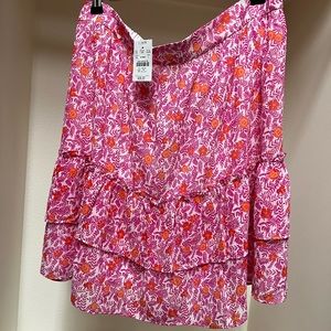 Pink and orange and white mini skirt. Size large.